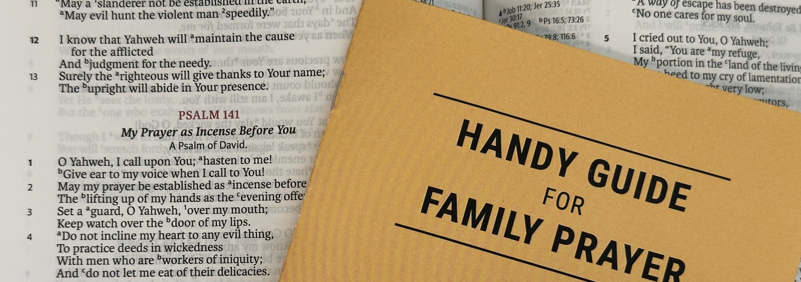Prayer Guide over the Bible opened to Psalm 141.